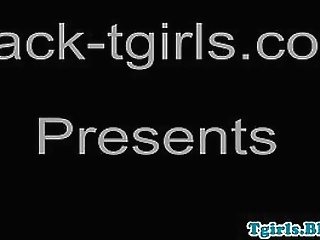 black shemale plays with her big stiff dick