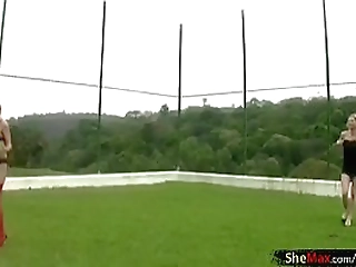 four blonde chicks with dicks play volleyball and strip down