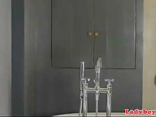 mature ladyboy tugs on her fat cock