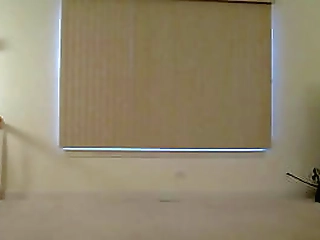 tanned blonde crossdresser in daisy dukes and thigh boots